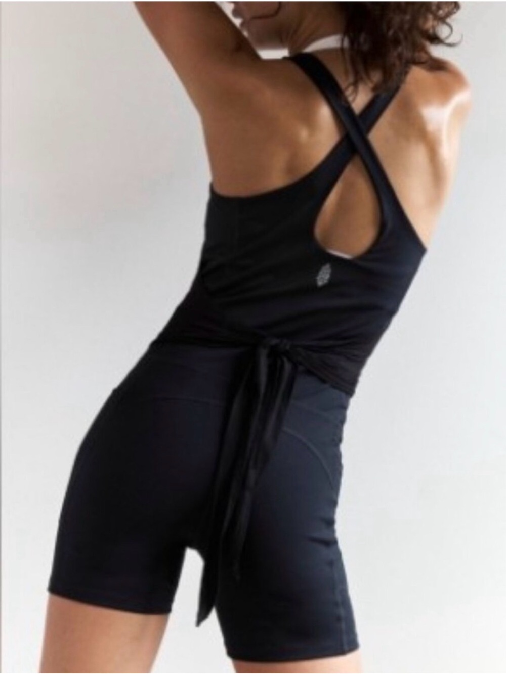 Free People Black High-Rise Athletic Bike Romper with tie back